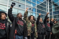  Members of BYP100&#039;s Chicago chapter rally on January 16 at the Fraternal Order of Police credit union demanding that the city divest from the police department.