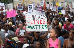 ﻿ Demonstrators protest the death of Eric Garner on August 23, 2014, in Staten Island. 