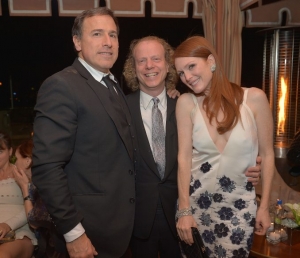 Director David O. Russell, left, Cohen and Moore at an after-party following the Screen Actors Guild Awards in 2013. 